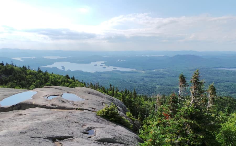 Granite outcrop above a lake with pines, typical of the Canadian Shield through Muskoka and Parry Sound